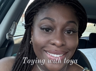 Toying_with_toya
